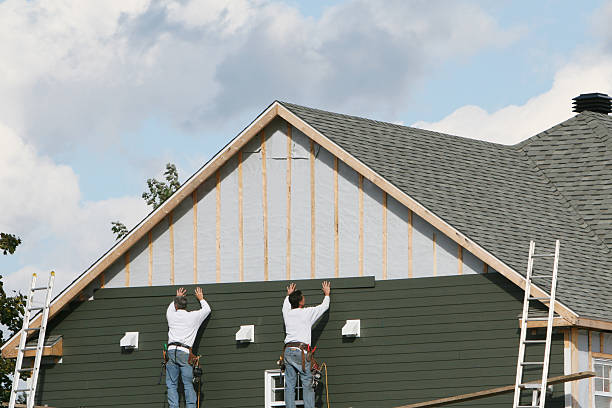 Professional Siding Installation technician working in Millersburg, PA